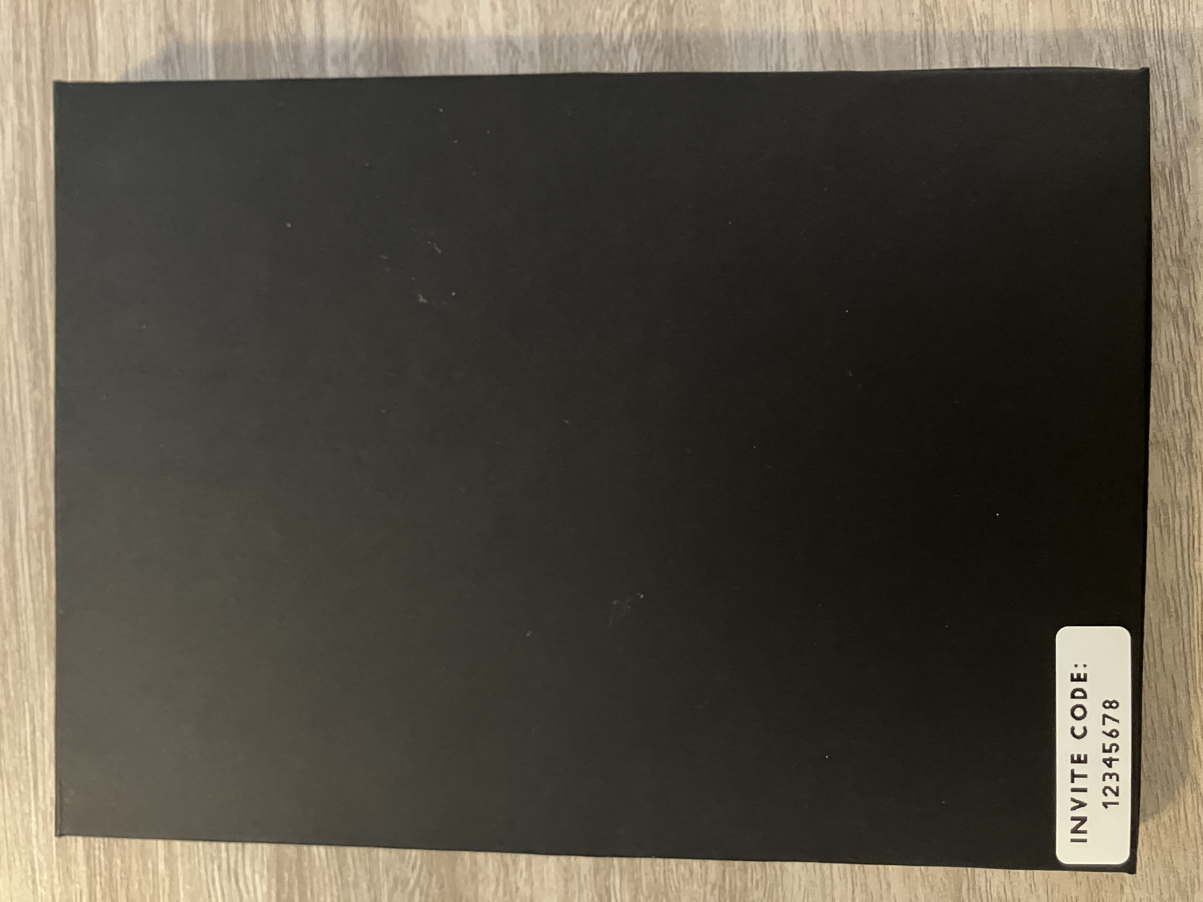 Back of invitation showing where invite code is printed